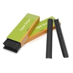 Two Black 11" Fastback Super Strips are displayed alongside their green and orange packaging, showcasing their ribbed texture and sleek design.