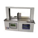 Graphic Whizard SP Bander Banding Machine and Accessories shown with a stainless steel body, a digital control panel, and an open banding area for securing materials.