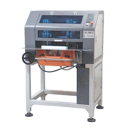 A James Burn DCR-400 Dual Corner Rounding Machine is a high-capacity industrial unit featuring dual cutting heads and a robust stand, designed for efficient and precise corner rounding on large volumes of materials.