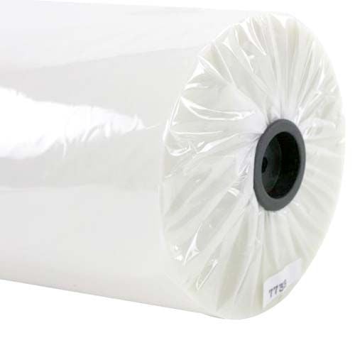 Close-up of a roll of 5 Mil Standard Roll Laminating Film with a black core and clear plastic wrapping. Close-up of a roll of 5 Mil Standard Roll Laminating Film with a black core and clear plastic wrapping.