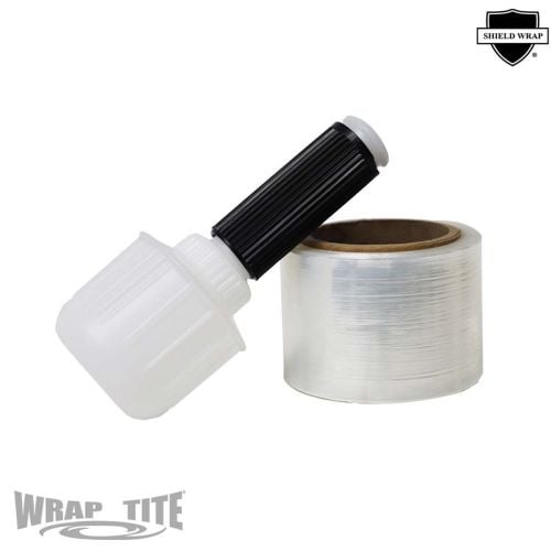 A roll of Wrap-Tite Cast Narrow-Width Banding Stretch Wrap Films with Spinner Handle, featuring a compact, clear film along with a durable black and white spinner handle designed for smooth, controlled application and reduced hand fatigue.