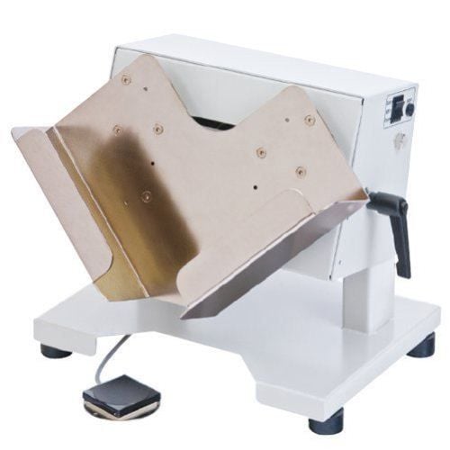 An MBM JT 7 Tabletop Jogger, a compact machine designed to align and organize stacks of paper efficiently.