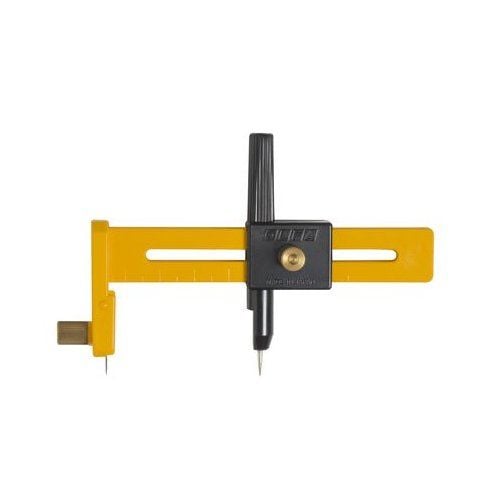OLFA CMP-1 Compass Circle Cutter with a yellow adjustable arm, a black central locking mechanism, and sharp points designed for precise circle cutting in various materials.