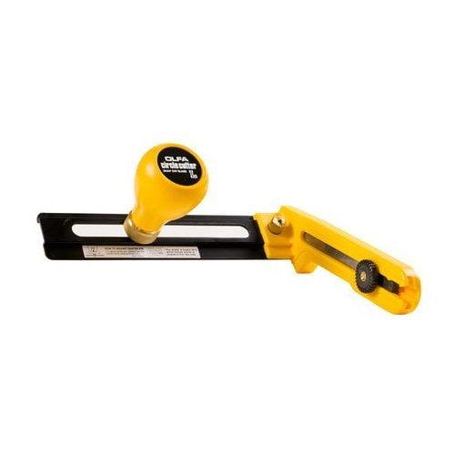 OLFA CMP-2 Heavy-Duty Compass Circle Cutter featuring a yellow ergonomic handle, an adjustable black blade arm, and a central knob for precise circle cutting in heavy-duty materials.