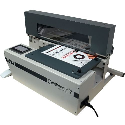 A James Burn Onglematic O7 Tab Cutter w/ 1/2 Ext. Double Round Corner, showing a document being precisely cut with its advanced corner cutting mechanism. A James Burn Onglematic O7 Tab Cutter w/ 1/2 Ext. Double Round Corner, showing a document being precisely cut with its advanced corner cutting mechanism.