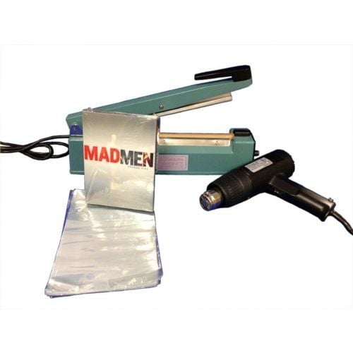 A "SealerSales 12" Shrink Wrapping Starter Kit w/ 6.5" x 10.5" DVD Shrink Bags" displayed with a heat sealer, heat gun, shrink wrap bags, and a DVD case labeled "MADMEN."