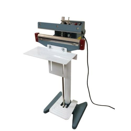 A SealerSales KF-Series 12" Foot-Operated Impulse Sealer with a sturdy metal frame, a white base, and a heating element for sealing, shown with its power cord extended.