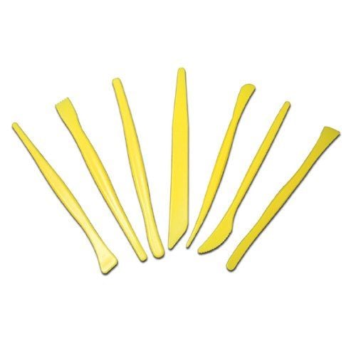 A set of bright yellow tools from the 7-Piece Wrap Pro Tuck and Groove Tool Kit, featuring various shapes and tips designed for detailed wrapping and grooving work.