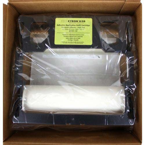 A Xyron 850 Lamination / Permanent Adhesive Cartridge 50' refill in its original packaging, showing the adhesive roll and black plastic frame.
