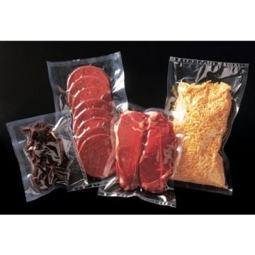 Several 4mil Clear Vacuum Bags filled with different food items, including sliced meat, steak, shredded cheese, and dried goods, showcasing their airtight sealing and transparent design for food preservation.