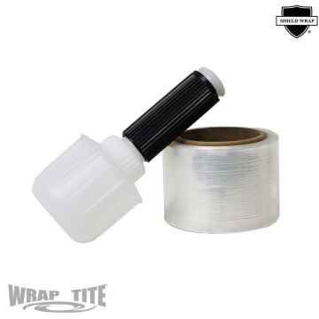 A roll of Wrap-Tite Cast Narrow-Width Banding Stretch Wrap Films with Spinner Handle, featuring a compact, clear film along with a durable black and white spinner handle designed for smooth, controlled application and reduced hand fatigue.