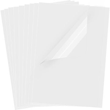 Stack of 8.5" x 11" 5mil Clear No Stripe Transparency Film sheets with one sheet slightly peeled back, showcasing its smooth and glossy surface.