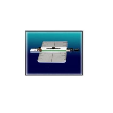 Aamstamp Pencil Attachment placed on a rectangular alignment grid with a gradient blue background.