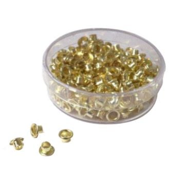 Akiles Brass Plated Eyelets shown in a clear plastic container with a few individual eyelets displayed in front.