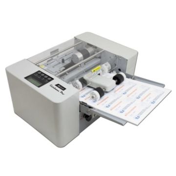 A Martin Yale 10-up Business Card Slitter machine in action, precisely cutting sheets into individual business cards.