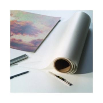 A roll of Artshield Satinex UV 3mil 41" x 300' Overlaminating Film is unrolled on a table, alongside cutting tools and a partially covered artwork.