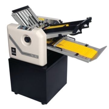 A Baum 714XLT Ultrafold Air Feed Tabletop Paper Folder with Steel & Urethane Rollers, featuring a compact design and yellow paper feed trays.