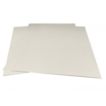 Thin, white biodegradable 1/8" corrugated graphics boards with a smooth surface and slightly peeled corner, revealing their layered construction.