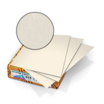 Classic Crest Baronial Ivory 80lb Covers shown with a close-up view of the paper's texture and color.