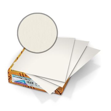 A stack of Classic Crest Natural White 80lb Covers showing smooth, heavyweight paper with a light cream tone.