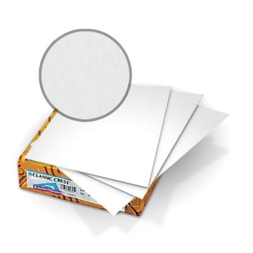 Stack of Classic Crest Solar White 80lb Covers showing smooth white surface texture in close-up.