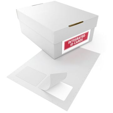 A box labeled "Integrated ID Cards" alongside a sheet of Peel-Out Style 2up Printable Integrated Synthetic ID Cards with one card partially peeled off, showing its adhesive backing.