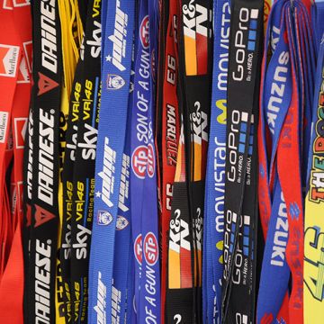 A variety of Custom Printed Lanyards in different colors and designs, featuring bold logos and branding for organizations, events, or promotional use.