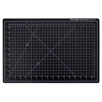 A black Dahle 12" x 18" Vantage Self-Healing Cutting Mat with a grid pattern, measurement markings, and diagonal guidelines for precise cutting and crafting tasks.
