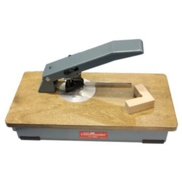 A Lassco Wizer Cornerounder CR-50B Heavy-Duty Manual Tabletop Corner Rounder with a sturdy lever handle and a wooden base, designed for precise corner rounding on a compact tabletop setup.
