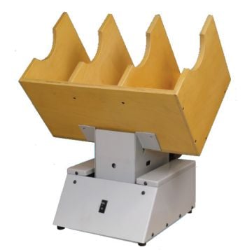 The Lassco Wizer LJ-10 Multi Bin Paper Jogger, a tabletop machine with a sturdy wooden platform designed for aligning stacks of paper.