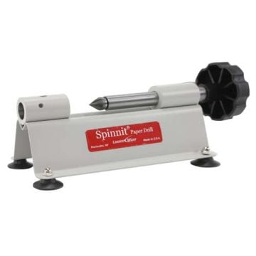 A close-up view of the Spinnit MS-1 Manual Drill Sharpener, featuring a compact metal design with a precision drill bit and a black adjustment knob, mounted on a stable base with suction cups.