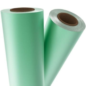 Two rolls of Light Green Matte Metallic Laminating / Toner Fusing Foil, showcasing a smooth metallic finish and cylindrical cores.