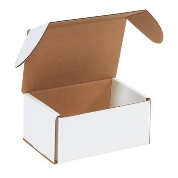 A white outside tuck mailer is positioned upright with its top flaps opened, showcasing the contrasting brown interior and a clean, sleek design.