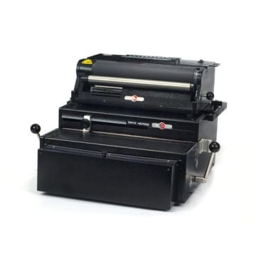 The Rhin-O-Tuff 7000C4 Ultra Duty Electric Coil Binding System, showcasing its robust design and heavy-duty binding capabilities.