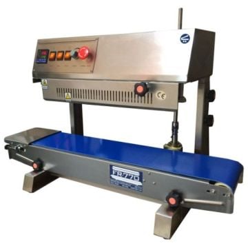 The SealerSales FR-770II Vertical Continuous Band Sealer (Left Feed) features a stainless steel construction with a control panel, bright blue conveyor belt, and a sealing mechanism for continuous operation.