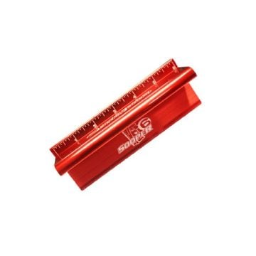 A red Sooper Edge 6" Safety Ruler with a durable design, featuring a raised edge and a clear measurement scale etched along its surface.