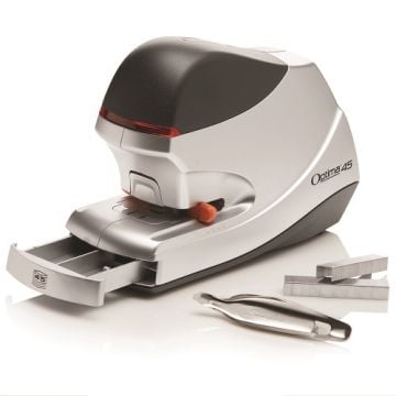 Swingline Optima 45 Electric Stapler with an open staple tray, stapler remover, and spare staples beside it.