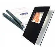 Three Coverbind Covers in different styles, including a black one with a window and two others lying flat.